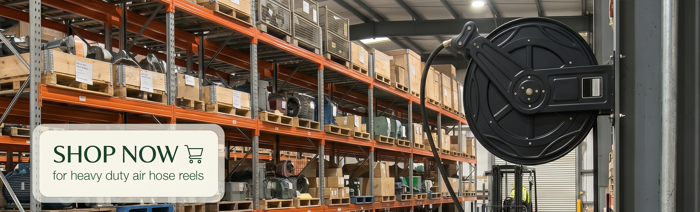 Warehouse aisle with tall orange shelving and a large black hose reel on the right; overlay text reads 'SHOP NOW for heavy duty air hose reels'.